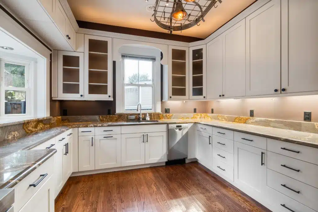 https://impressionskitchens.com/wp-content/uploads/2023/09/durable-wood-kitchen-cabinets-1024x683.jpg.webp